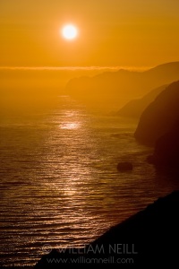 Sunset over Pacific Ocean and coast, Big Sur, California